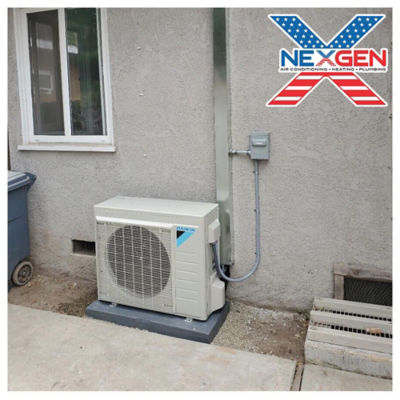 A Daikin Ductless Unit connected to a home.