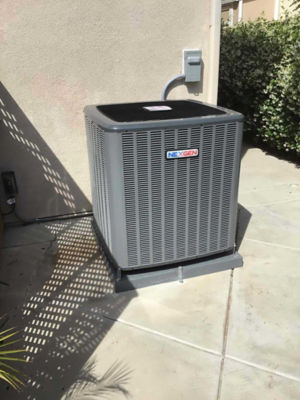 An AC unit connected to a building.