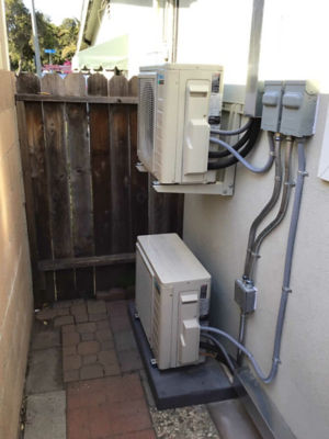 A Daikin Ductless Unit connected to a home.