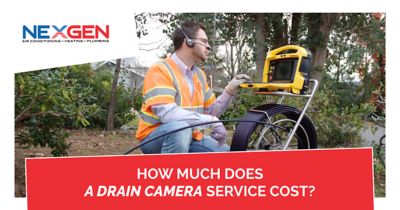 A man using equipment to inspect a sewer.