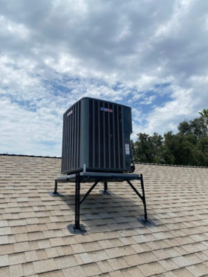 An AC unit on a roof.