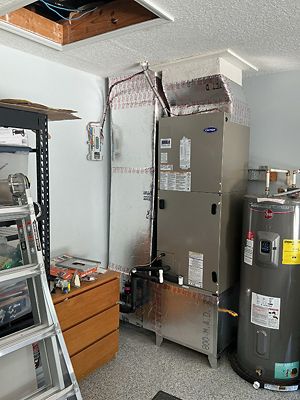 A nice clean ac and water heater installation completed by Donovan