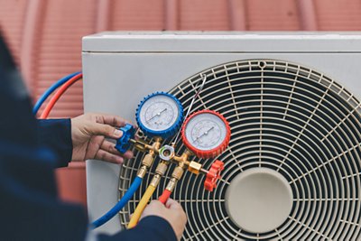 Tech checking Ac unit 