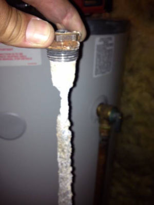 https://wg.scene7.com/is/image/wrenchgroup/old-water-heater-anode-rod-pl21wi001wg?$Wrench_New$