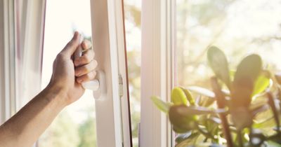 Man opening the windows