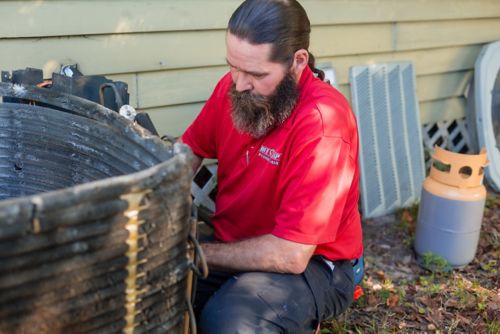 outdoor ac tune up red cap technician