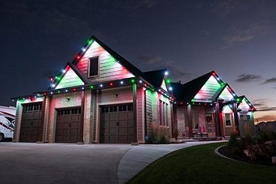A home with Christmas-themed permanant outdoor lighting