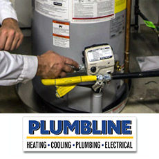 Plumber repairing a water heater