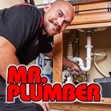 Mr. Plumber fixing a kitchen sink drain in a Dunwoody home