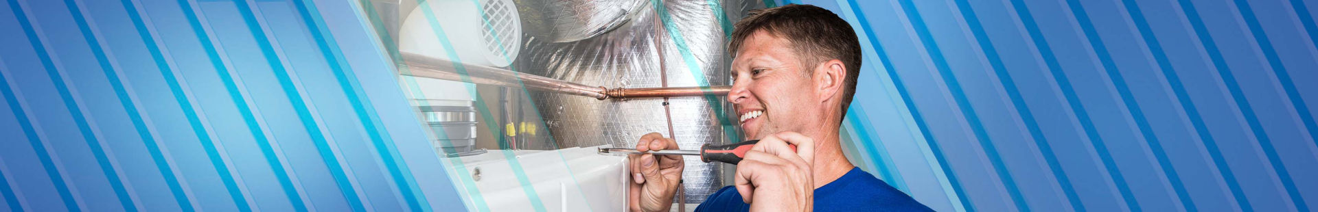 Plumber inspecting tankless water heater