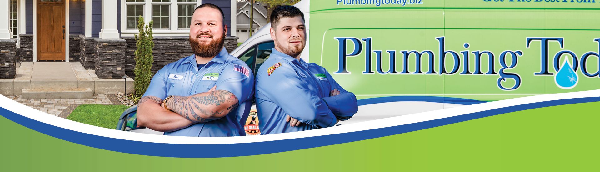 Plumbers standing back to back in front of Plumbing Today van