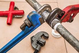 wrench-fixing-plumbing-pipes