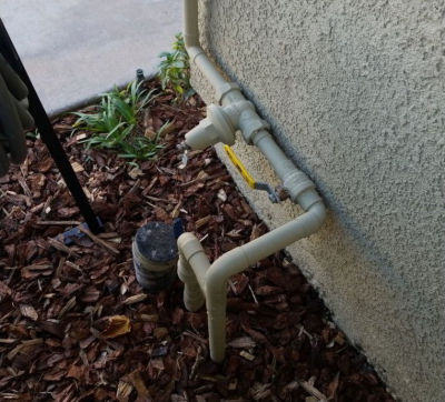 Pipes coming out of house