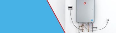 A tankless water heater on a wall.