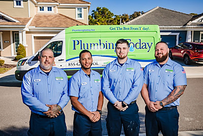 Plumbing Today plumbers in front of a service van in Riverview, Florida