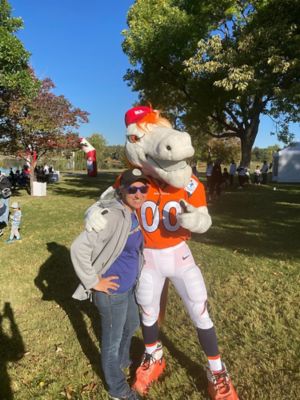 At the ALS event with horse mascot