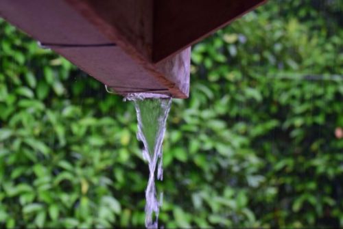 Water coming out of a gutter