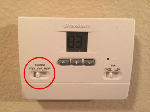 Thermostat on Wall Controlling Heat Pump