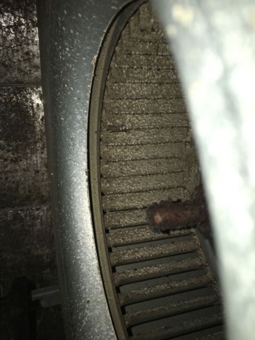  A dirty air filter with dirt on it 