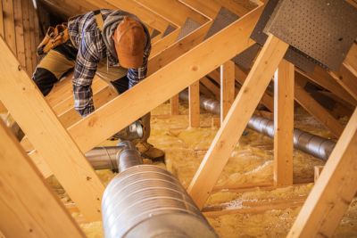 A Person Working on a Roof