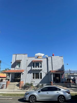 Nex Gen Technician in a red shirt on top of a building