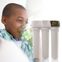 Boy drinking water purified with Ro PurePro