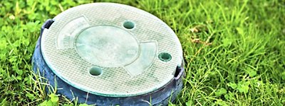 A sewer-line in the grass