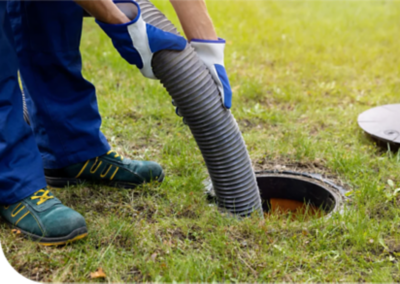 Image of a technician repairing a sewer line.