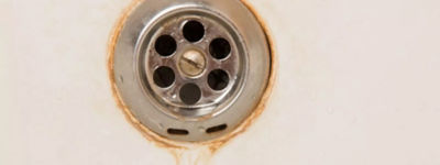 Water staining a drain in a sink - Thomas & Galbraith Heating, Cooling, & Plumbing