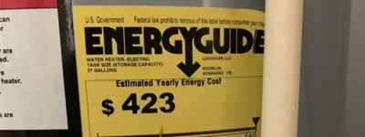 Closeup shot of a yellow Energy Guide sticker on a water heater