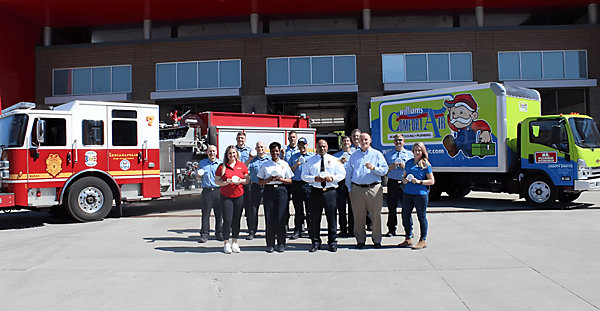 IFD team up with Resideo and Williams Comfort Air & Mr. Plumber to receive carbon monoxide detector donation.