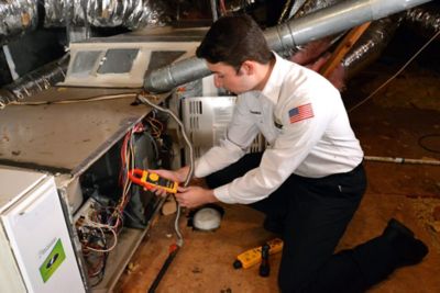 Tech working on Furnace