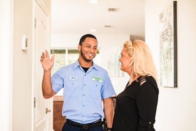 Cool Today HVAC tech talking to Oviedo homeowner