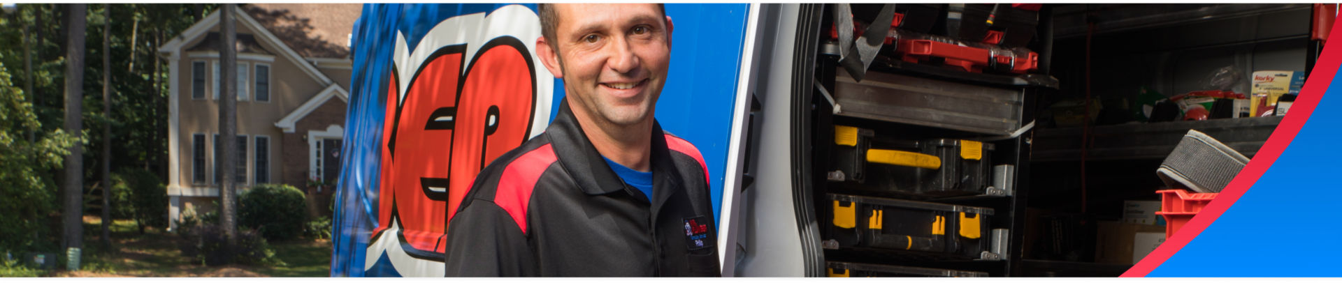 Plumber next to a Mr. Plumber van in Atlanta