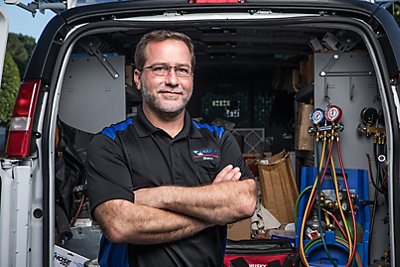 Smiling Coolray technician