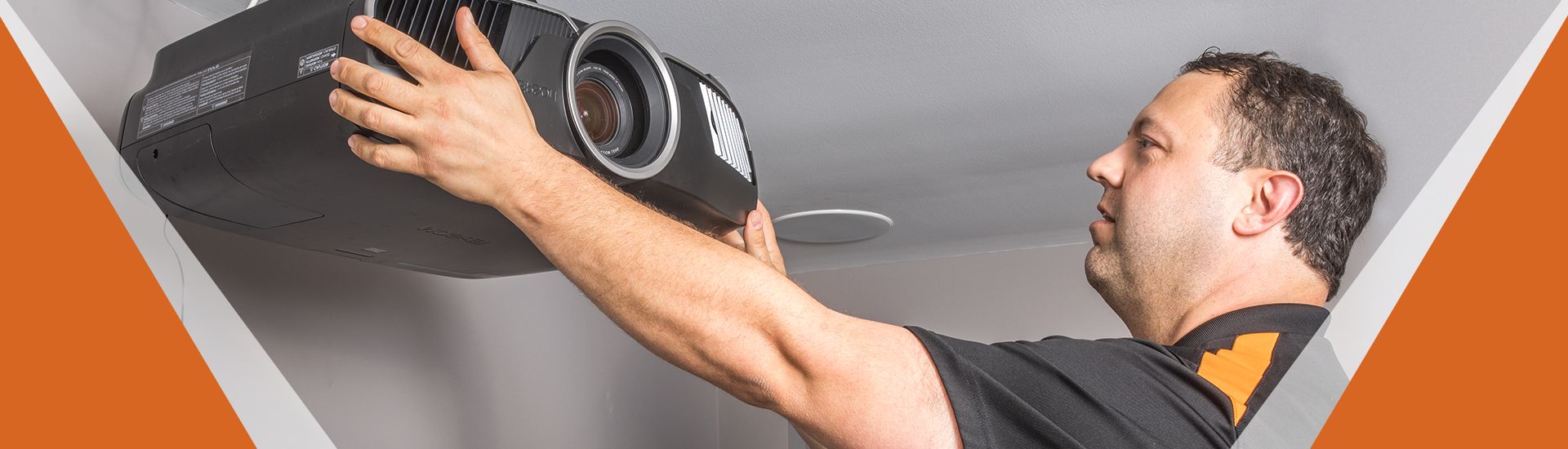 Britebox electrician installing a home theater system in a Sandy Springs, GA home