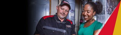 Ragsdale electrician with a homeowner in a Lawrenceville home