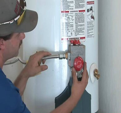 Technician Inspecting Water Heater
