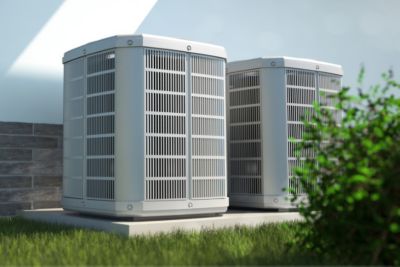 two ac units outside of a home