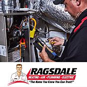 Ragsdale HVAC tech checking a system