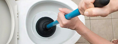 Trying to fix a clogged toilet by hand - Williams Comfort Air Heating, Cooling, Plumbing & More