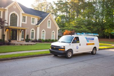 Coolray van parked in front of house