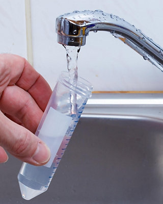 Testing water from the faucet - Williams Comfort Air Heating, Cooling, Plumbing & More