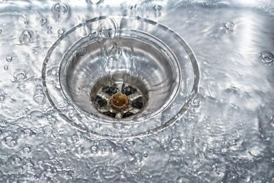 Why Are The Sinks Draining Slow In My Indianapolis Home   Water Flowing Into A Sink Drain Mpi23wi001wg