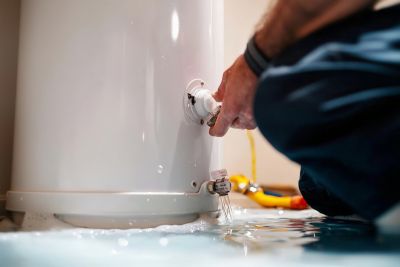 Water Heater being repaired flush & fill