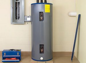 Water heater in closet with blue toolbox sitting next to it