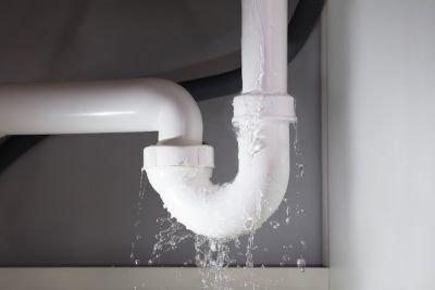 Pipe leaking under a sink 