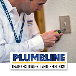 Electrician installing a switch