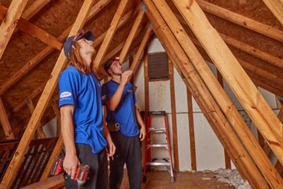 Attic insulation being installed in an Atlanta home