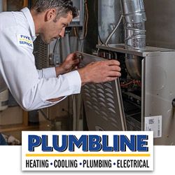 Plumbline tech repairing a furnace